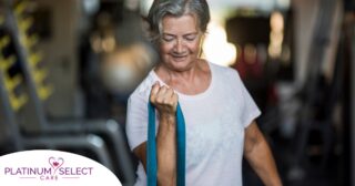 An older woman uses a resistance band to exercise, representing how staying active can help older adults keep their blood pressure in a healthy range.